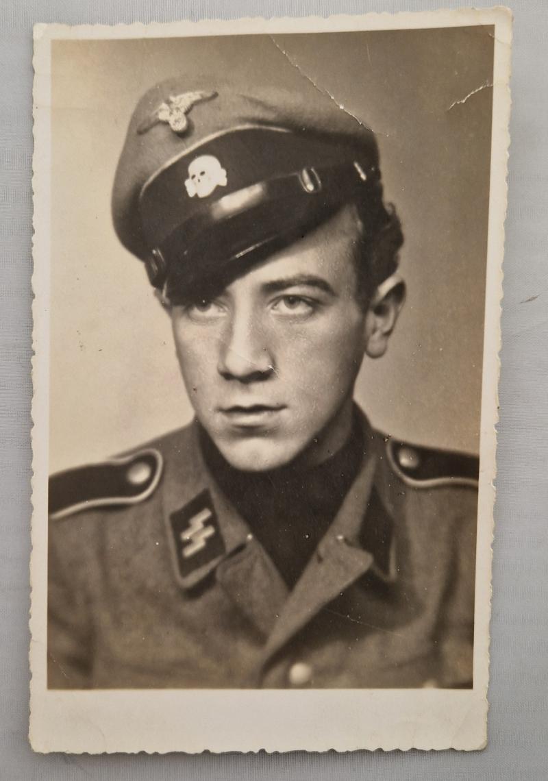 Photo Postcard of a Waffen SS Mann with visor cap.