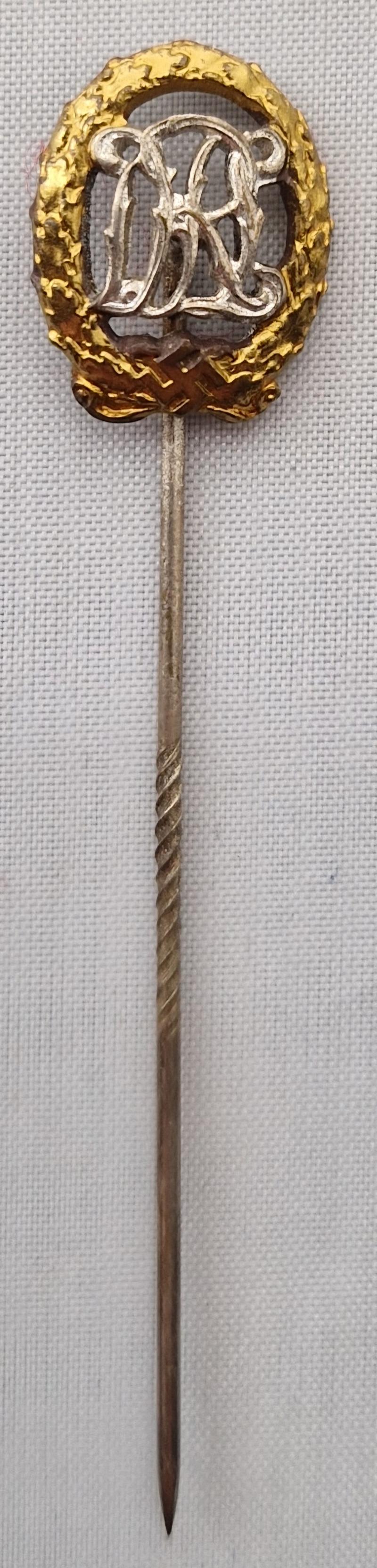 DRL silver/gold Sports Badge for War Wounded stickpin by Wernstein Jena.